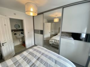 Bedroom One- click for photo gallery